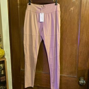 Leggings, blush in color w/moto style detail.